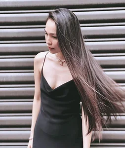 The Timeless Allure of Hien Thuc: Exploring Her Seductive and Youthful Fashion Style - image 0