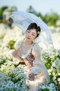 VGU No.191 1000024575: A Girl's Gentle Charm Amidst Pristine White Daisies in Winter. - image 5