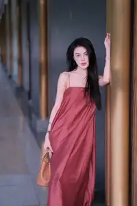 Stunning Maxi Dress Style: A Beautiful Woman's Elegant Pose. - image 3