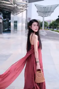 Stunning Maxi Dress Style: A Beautiful Woman's Elegant Pose. - image 4