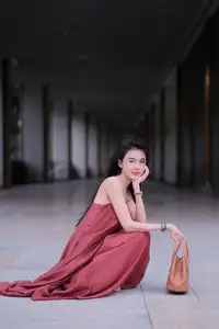 Stunning Maxi Dress Style: A Beautiful Woman's Elegant Pose. - image 8