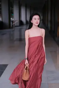 Stunning Maxi Dress Style: A Beautiful Woman's Elegant Pose. - image 5