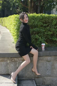 Wan Ping for IESS: Sophisticated Urban Style in the Black Hip-Hugging Skirt Collection - image 42