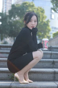 Wan Ping for IESS: Sophisticated Urban Style in the Black Hip-Hugging Skirt Collection - image 6