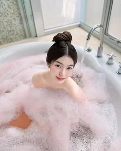 Stunning Beauty and Elegance: A Captivating Bathtub Portrait Gallery Exploring Modern Self-Care Aesthetics - image 9