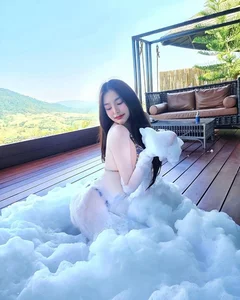 Stunning Beauty and Elegance: A Captivating Bathtub Portrait Gallery Exploring Modern Self-Care Aesthetics - image 6