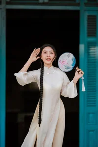 Elegant White Modern Ao Dai: A Timeless Vietnamese Tradition for Minimalist Street Style and Cultural Travel Inspiration - image 1