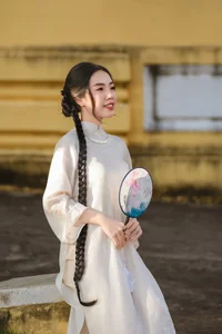 Elegant White Modern Ao Dai: A Timeless Vietnamese Tradition for Minimalist Street Style and Cultural Travel Inspiration - image 5