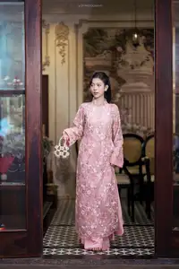 Graceful Pink Ao Dai Beauty: Elegant Vietnamese Woman with Alluring Pearl Jewelry - image 6