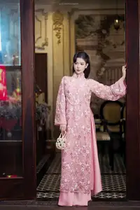 Graceful Pink Ao Dai Beauty: Elegant Vietnamese Woman with Alluring Pearl Jewelry - image 2