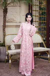 Graceful Pink Ao Dai Beauty: Elegant Vietnamese Woman with Alluring Pearl Jewelry - image 8