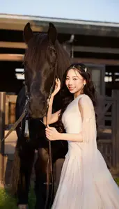 Elegant Beauty: Graceful Girl with a Majestic Black Horse - image 3