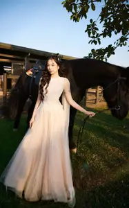 Elegant Beauty: Graceful Girl with a Majestic Black Horse - image 1