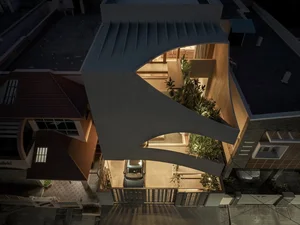 Modern Urban Townhouse Architecture: Innovative Recessed Facade Design for Contemporary City Living - image 8