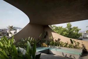 Modern Urban Townhouse Architecture: Innovative Recessed Facade Design for Contemporary City Living - image 2
