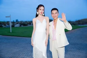Miss To Diep Ha Steals the Spotlight in an Elegant White Silk Red Carpet Dress - image 4