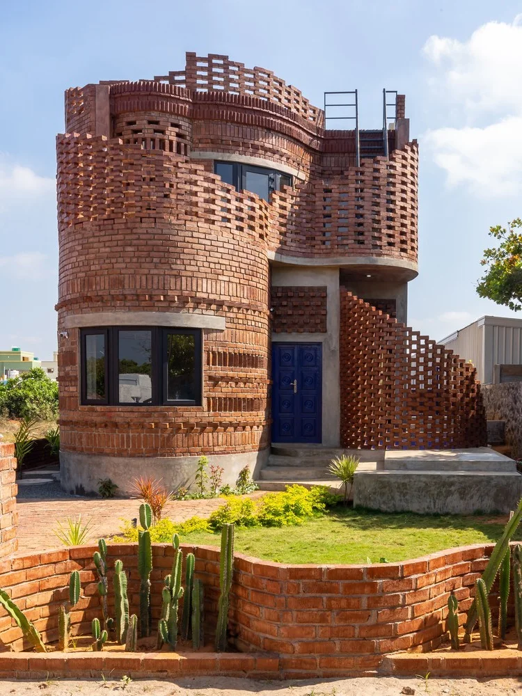 Innovative Architecture: The Unique Brick House Inspired by Rhythmic Ocean Waves
