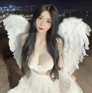 Rising Female Streamer Captivates Online Community with Ethereal Angel-Themed Photoshoot - image 4