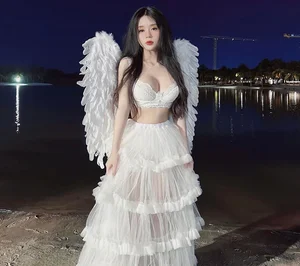 Rising Female Streamer Captivates Online Community with Ethereal Angel-Themed Photoshoot - image 5