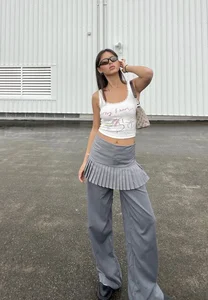 The Rise of the Dress-Over-Pants Trend: Redefining Street Style for Gen Z - image 8