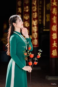 Timeless Elegance in Emerald Green Ao Dai - image 9