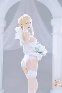 FGO Saber Bride: Shika XiaoLuLu Shines in Pristine White Wedding Dress - A Game Muse Brought to Life - image 2