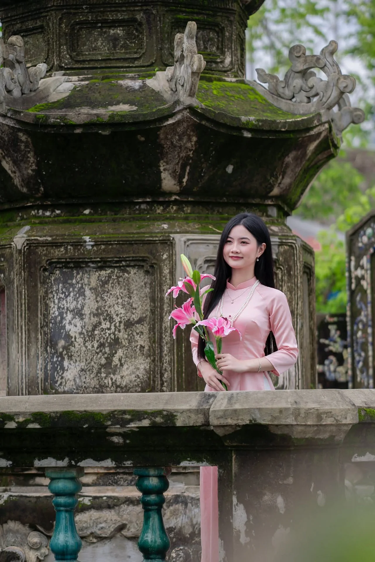 Elegant Vietnamese Beauty Amidst Ancient Architecture