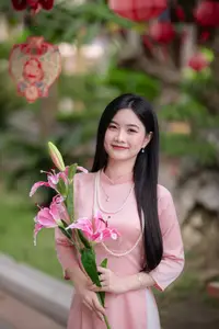 Elegant Vietnamese Beauty Amidst Ancient Architecture - image 1