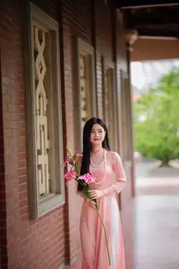 Elegant Vietnamese Beauty Amidst Ancient Architecture - image 6