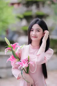 Elegant Vietnamese Beauty Amidst Ancient Architecture - image 7