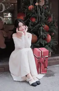 Christmas Radiance: Girl in Elegant White Dress and Joyful Smile - image 7