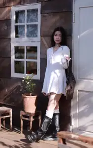 Discover the Unique Fashion Style of a Young Woman Blending Sweetness with Edgy Charm - image 3