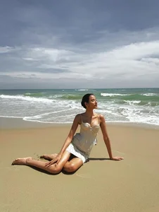 Hoang Thuy Flaunts Radiant Tanned Skin and Seductive Figure - image 2