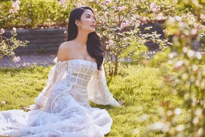 Hoang Thuy Flaunts Radiant Tanned Skin and Seductive Figure - image 0