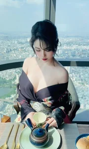 Timeless Elegance: A Serene Tea Moment Above the Clouds - image 6