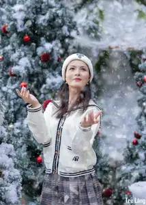 Charming Winter Girl Amidst Beautiful Christmas Snowfall - image 9