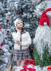 Charming Winter Girl Amidst Beautiful Christmas Snowfall - image 7