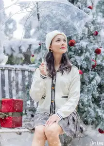 Charming Winter Girl Amidst Beautiful Christmas Snowfall - image 12