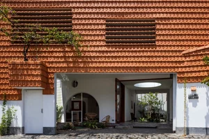 Sustainable Living in Lam Dong: The House with the Inverted Tile Roof - image 7