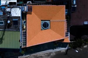 Sustainable Living in Lam Dong: The House with the Inverted Tile Roof - image 8