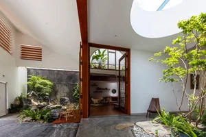Sustainable Living in Lam Dong: The House with the Inverted Tile Roof - image 3