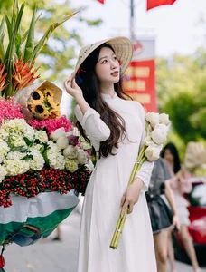 Elegant Vietnamese Education Student Shines in Traditional Ao Dai Street Photography Gallery - image 4