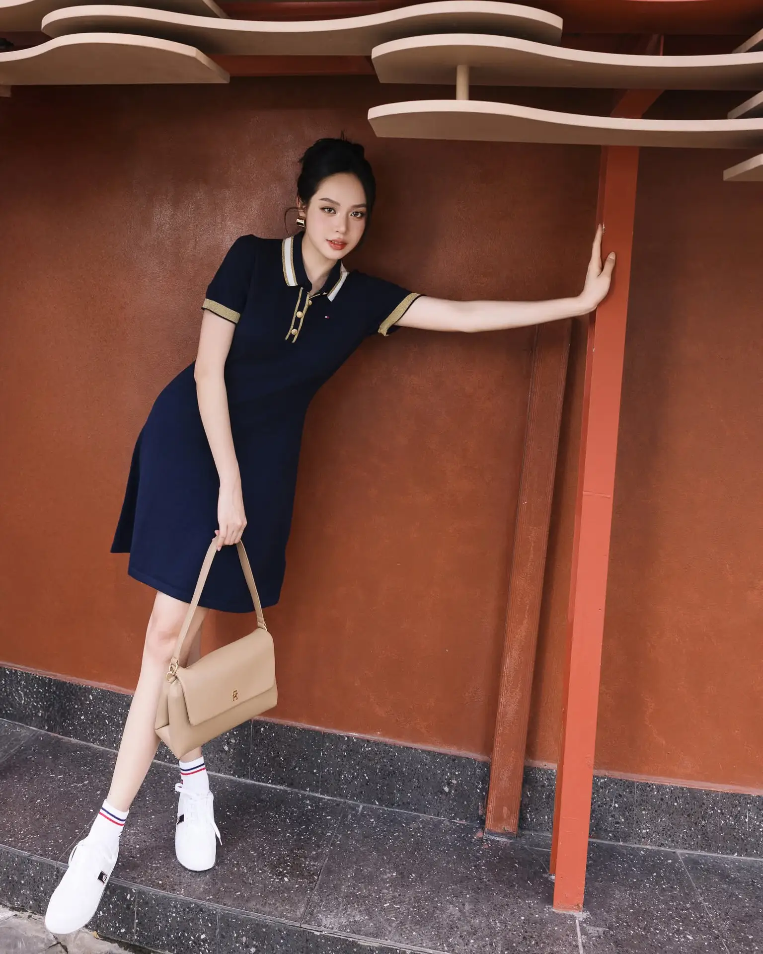 VGU No.181: Urban Muse Embraces Modern Elegance with Polo Dress and Chic Sneakers