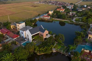 Innovative Sustainable Architecture: The Unique Green Curtain House in Thai Binh - image 3