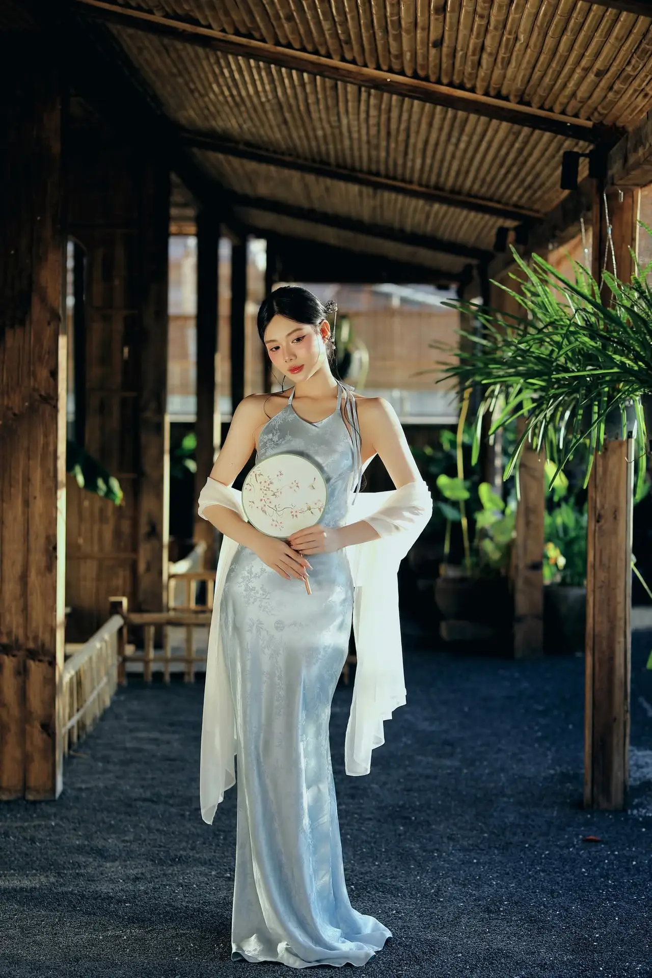 East Asian Grace: Girl in Modernized Attire and Exquisite Hair Ornament