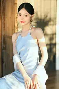 East Asian Grace: Girl in Modernized Attire and Exquisite Hair Ornament - image 2