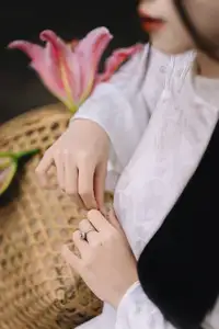 Discover the Grace of a Vietnamese Woman in White Ao Dai with Elegant Lilies - image 0