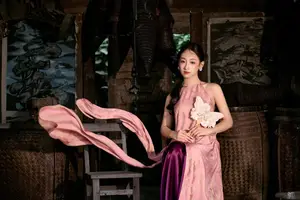 Captivating Asian Beauty Elegant Vietnamese Woman in Graceful Pink Attire - image 2