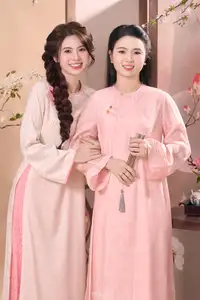 Radiant Smile of a Vietnamese Girl in Modern Ao Dai and Elegant Fan - image 5