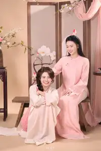 Radiant Smile of a Vietnamese Girl in Modern Ao Dai and Elegant Fan - image 1